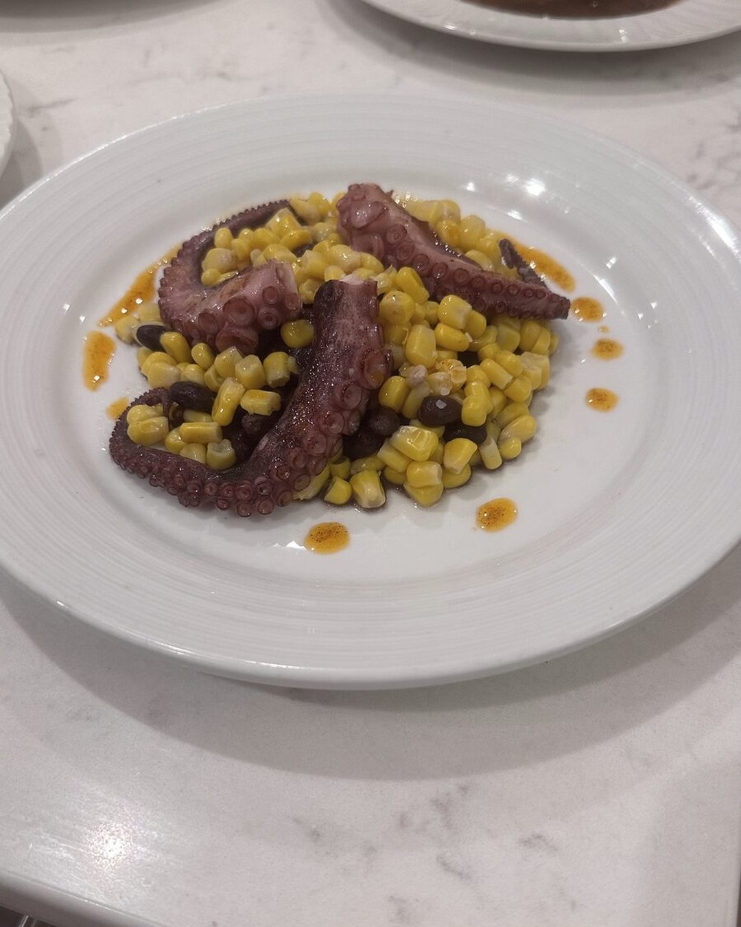Chef Tsai's grilled octopus with sweet corn and black beans